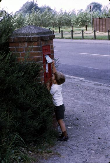 Me mailing a letter in England, 1970.