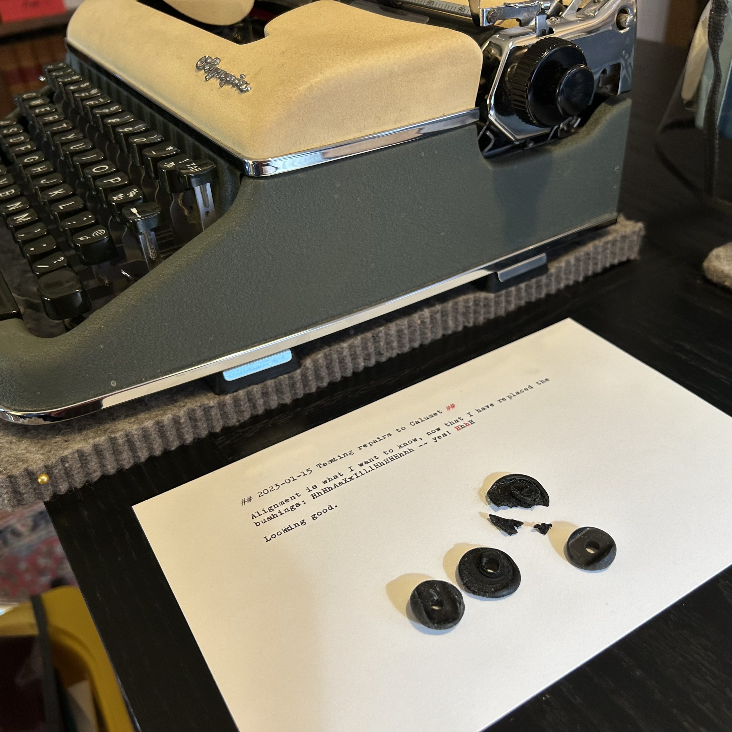 Photo of distorted rubber washers removed from a 1957 Olympia typewriter